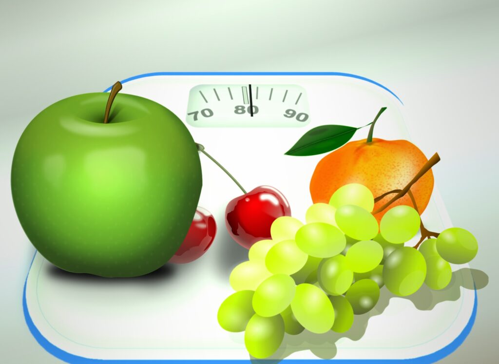 Blog PureColla pèse personne avec des fruits dessus
